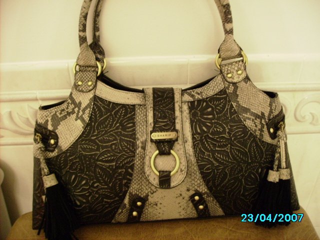 Sharif Suede designer handbag with tooled leather insets