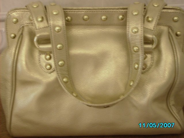 Carlos Falchi designer goatskin leather frame bag.