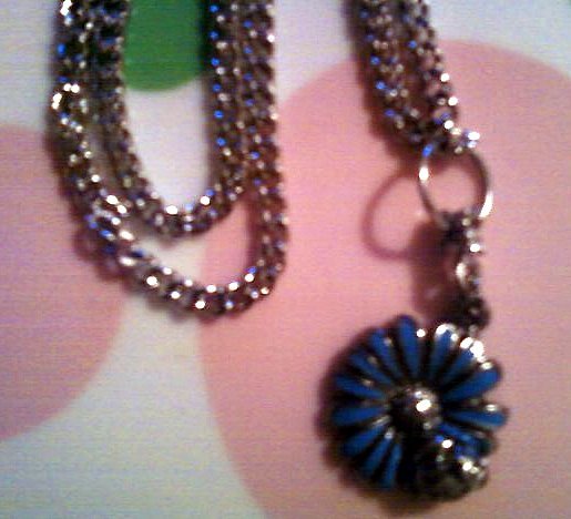 Silver Ladybug on a Blue Flower Necklace.