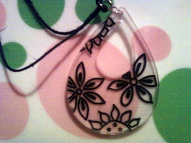 Large Clear and Black Necklace with Flowers.