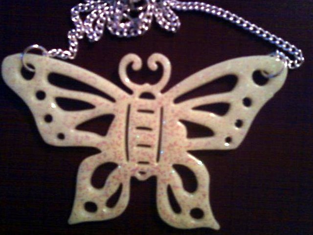 Large Glitter Glow in the Dark Butterfly Necklace.