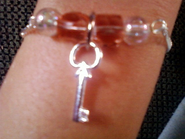 Silver Key and Bead Bracelet.