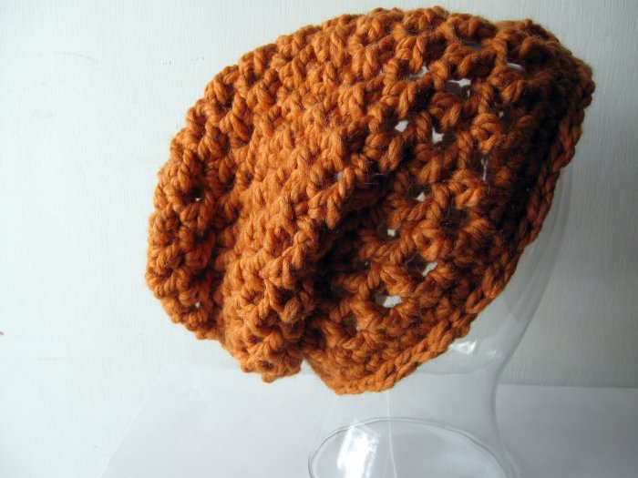 the slacker beanie hat in pumpkin orange.
