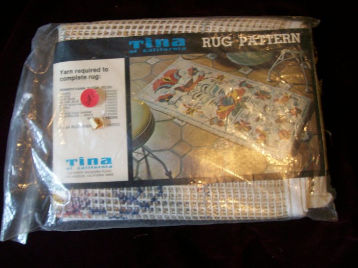 vintage Tina latch hook rug with Pennsylvania dutch design