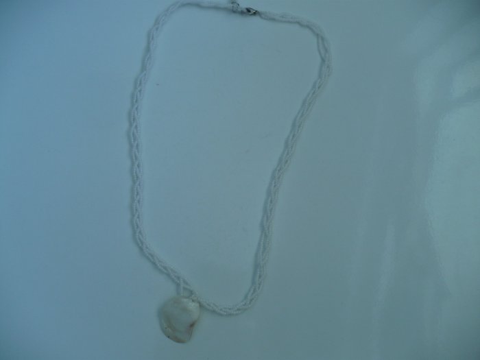 Full length necklace made with a sea shell and white glass seed beads