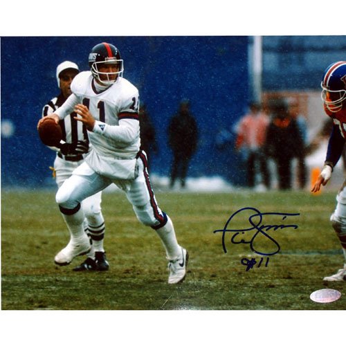 Phil Simms Signed Photo - 8x10 Passing In Snow Vs. Denver in Blue Ink