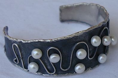 Hand made silver bangle