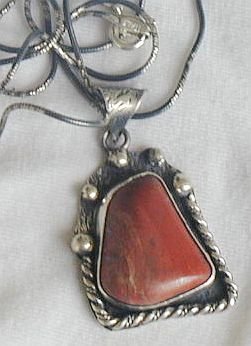 Red loam colored stone pendant