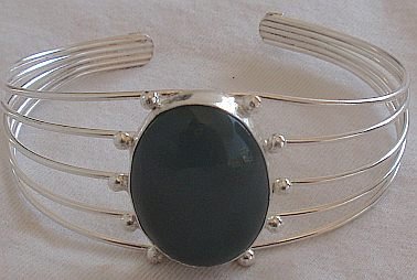 Black and red spots on a bangle