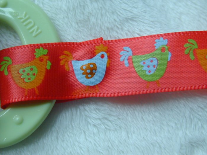 Red chicken binky clip