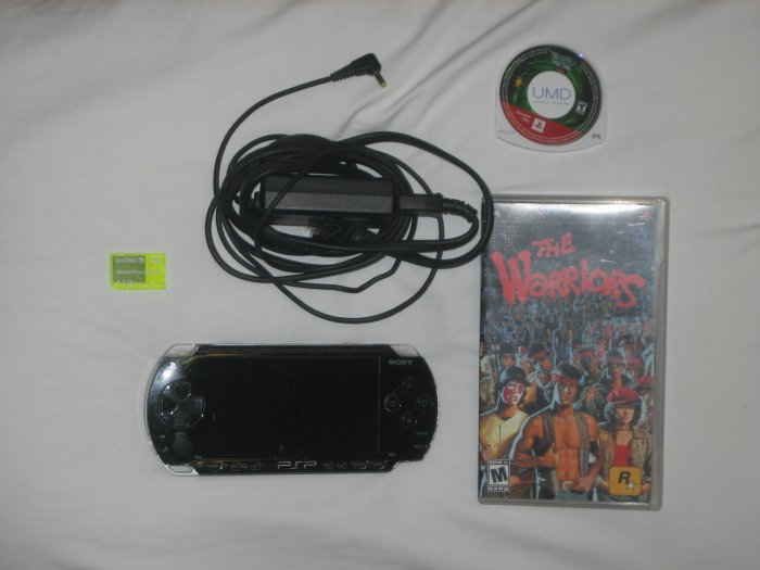 Psp handheld console w/games and w/1gb sandisk pro duo memory stick