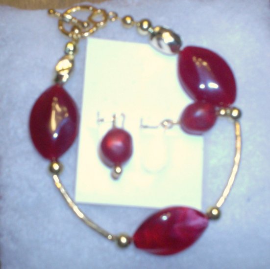 Ruby Red stones with gold spacers and earrings