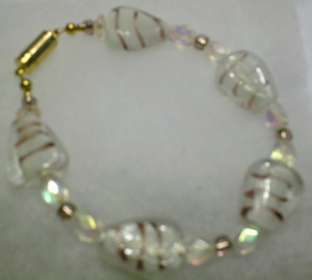 clear stone with purple strips ....