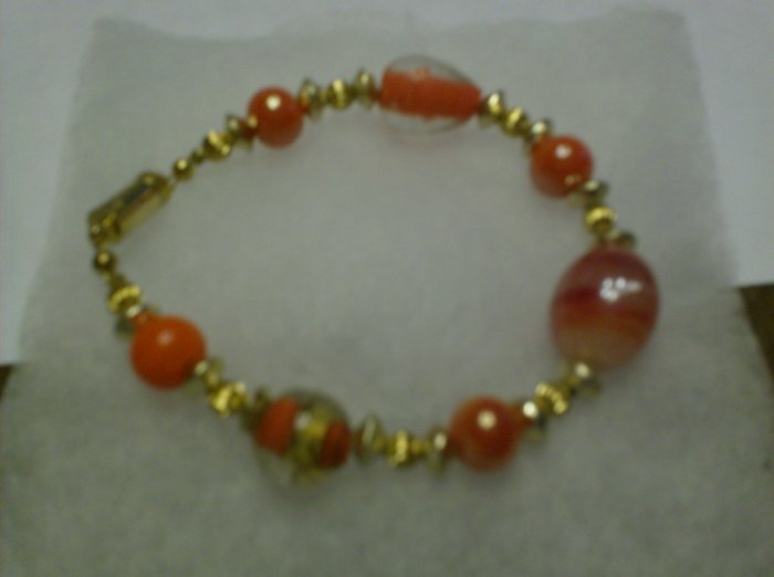 Orange/white bead mixture glass bracelet