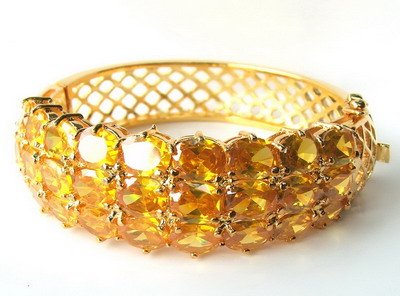 14k yellow gold Yellow sapphire bangle heated stone