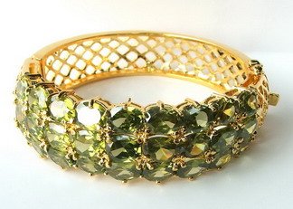 14k yellow gold Green sapphire bangle heated stone