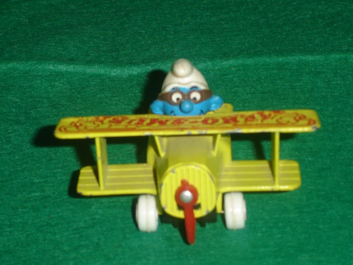 Vintage Smurfs 1982 Yellow Aero Smurf Airplane With Pilot Smurf in a Diecast ERTL Plane 1 64 Scale