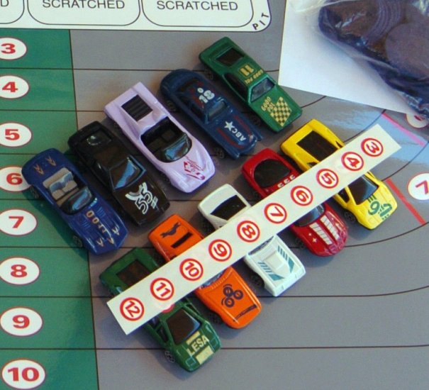 Die cast race cars & red # stickers (3-10)