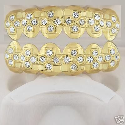 Cross of bling gold plated playa top and bottom grillz set