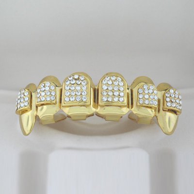 Ninety-Four points of ice Dracula style golden playa grillz