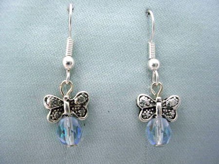 Silvertone butterfly and blue crystal bead earrings