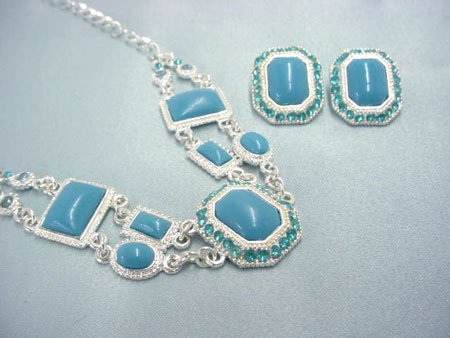 Turquoise color lucite and rhinestone necklace & earring set