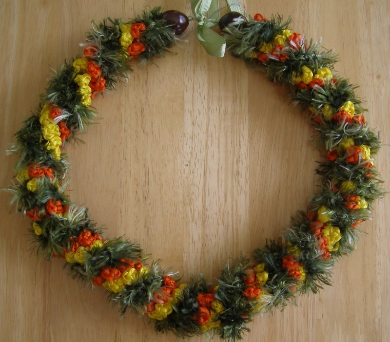 Hawaiian lei crochet w/ green eyelash yarn yellow orange satin ribbon