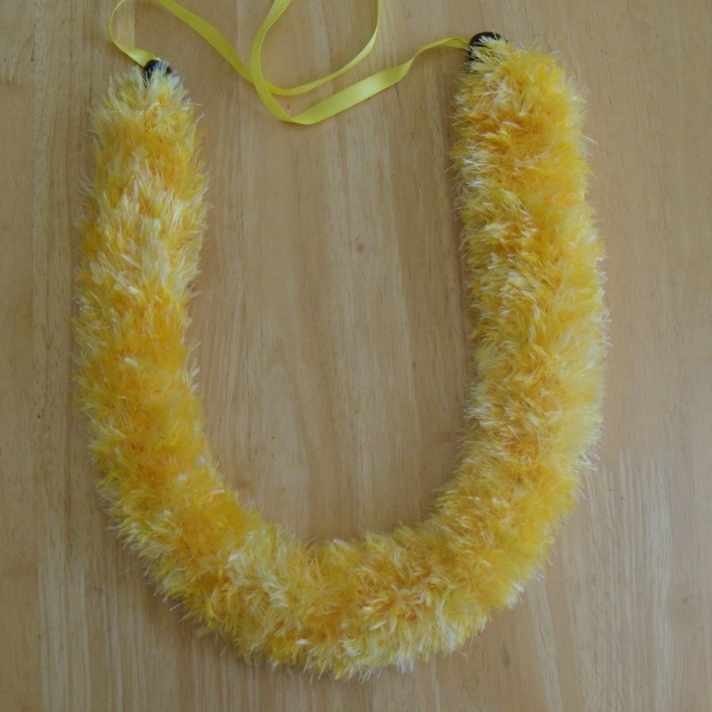 Hawaiian lei knit w/ yellow multicolor eyelash yarn