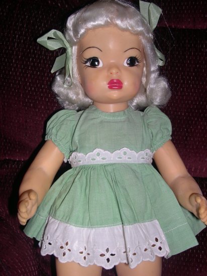 Terri Lee 16" Platinum 1950's hard plastic doll in green tagged dress