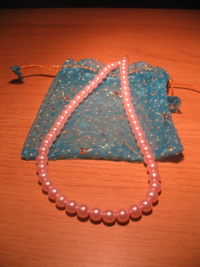 String of light pink faux pearls