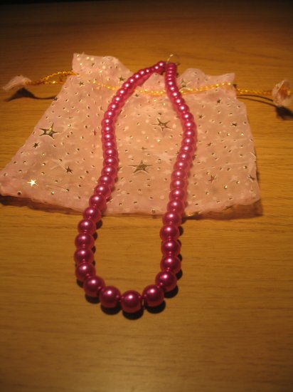 String of Fuschia pink faux pearls