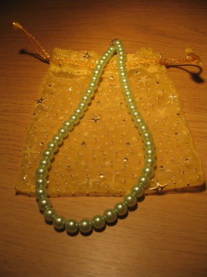 String of light green faux pearls