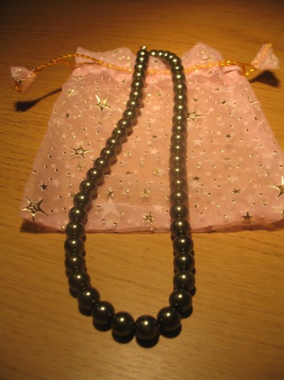 String of dark gray faux pearls
