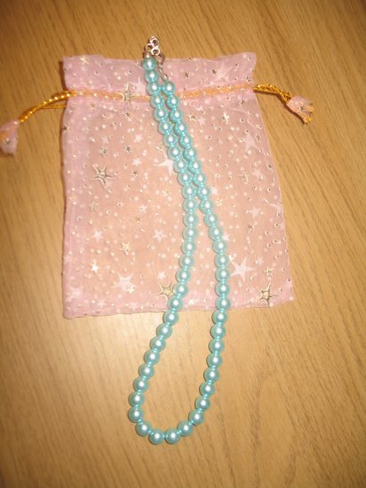 String of light blue faux pearls