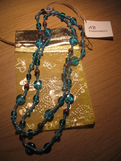 Turquoise glass and brown wood bead long necklace