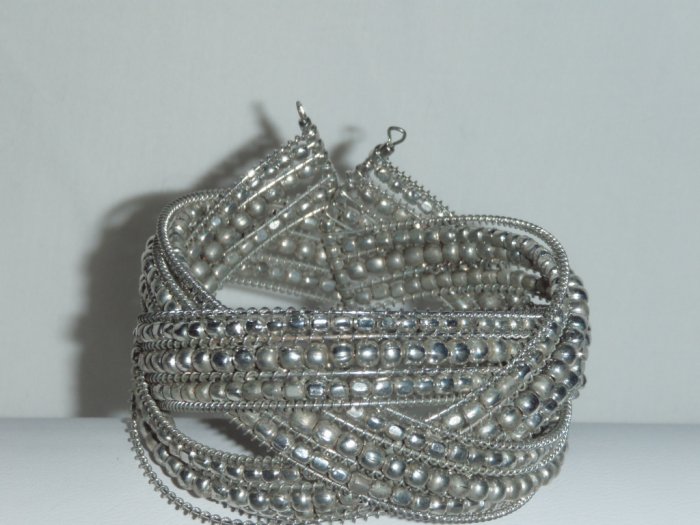 Silver tone intricately woven bead cuff