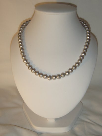 String of silver faux pearls