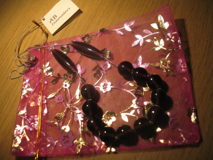 Purple glass beads on a silver tone chain (£14.00)