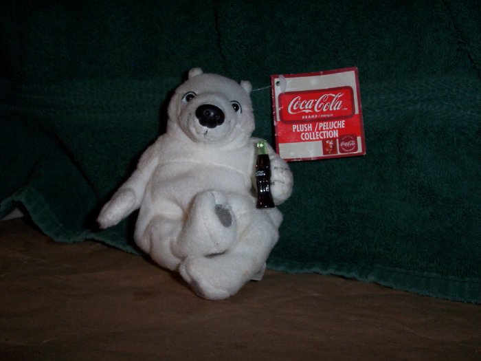 White Coca Cola Polar Bear with a Bottle of Coke