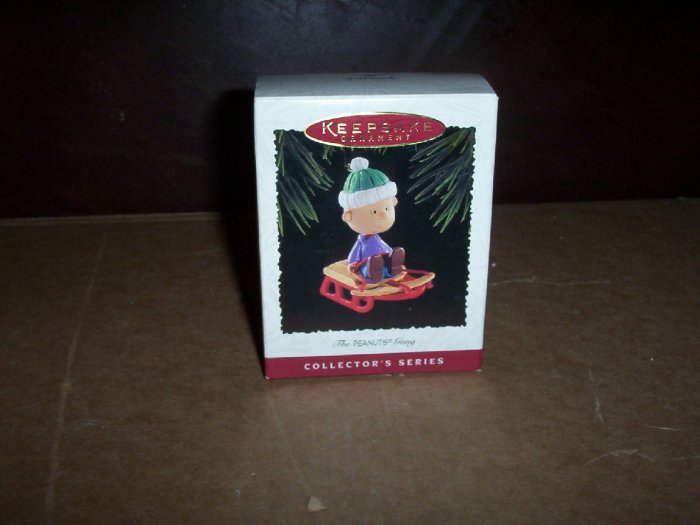 Linus on Sled Ornament