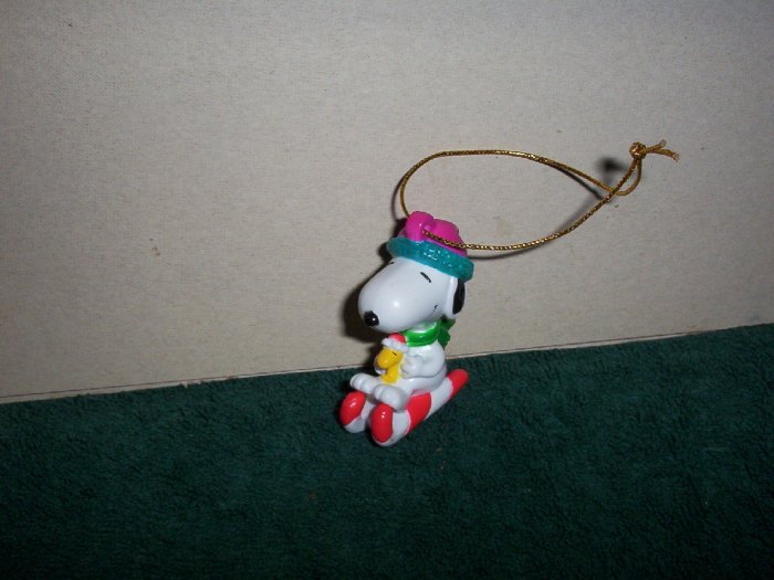 Snoopy on His Cane Cane Sled Ornament