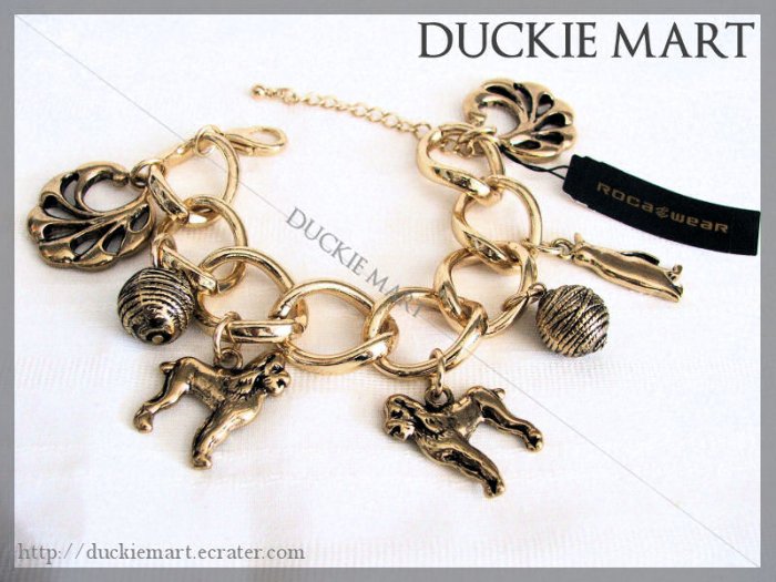 BRAND NEW Rocawear Multi Charm Chucky Bracelet