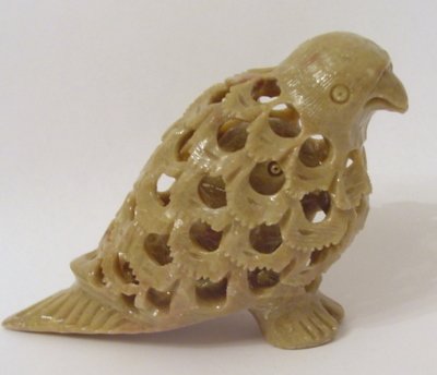 HAND CARVED STONE INSIDE TUMMY BABY FIGURINE Vulture