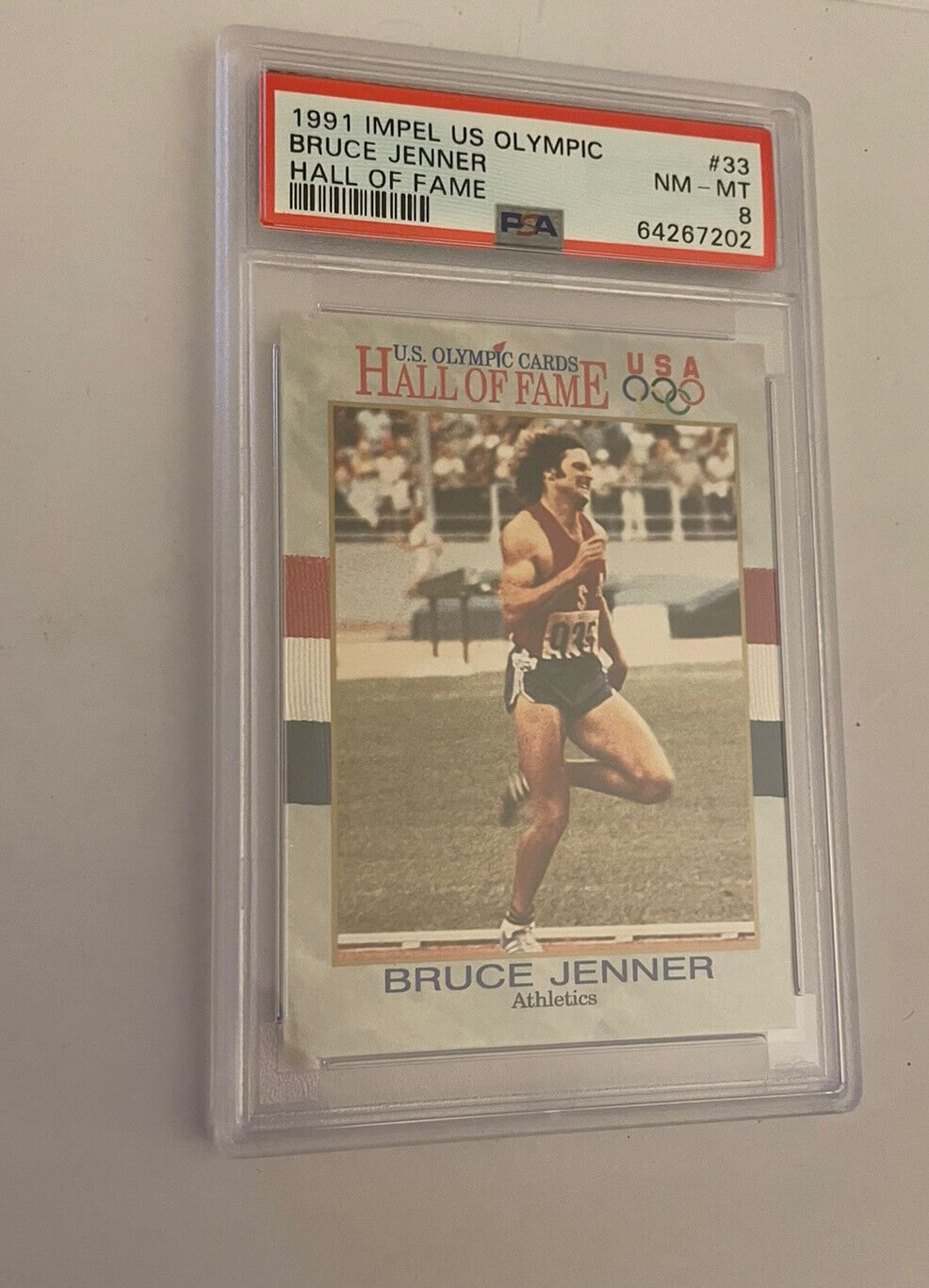 1991 Impel US Olympic Hall Of Fame Bruce Jenner 33 PSA 8 NM MT Graded Card