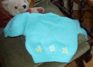 Newborn cardigan for a girl