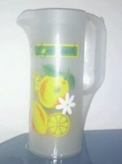 Plastic jug with plastic glasses inside