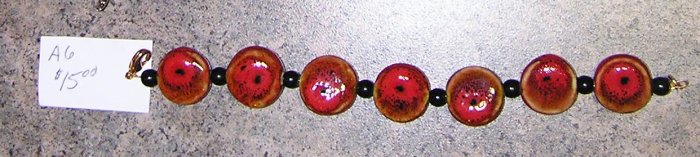 A6-Red Ceramic with Black Beaded Bracelet