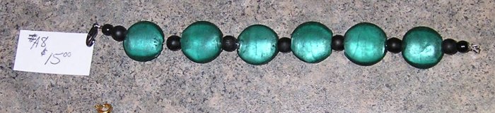 A8 - Bracelet - Emerald Colored Beads with Black Accents