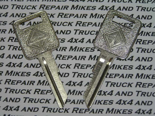 2 International Navistar truck tractor factory OEM key blank blanks with International Navistar logo
