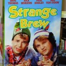 STRANGE BREW VHS STARRING DAVE THOMAS RICK MORANIS PAUL DOOLEY COMEDY  (B47)